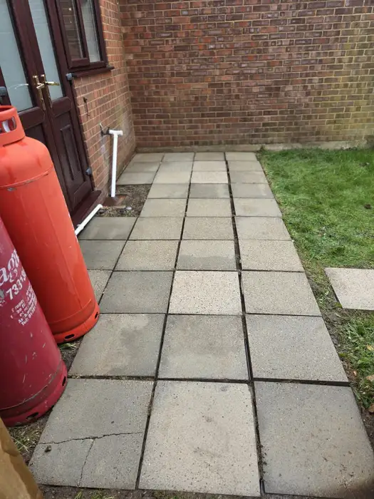 Clean weed-free patio slabs after pressure washing